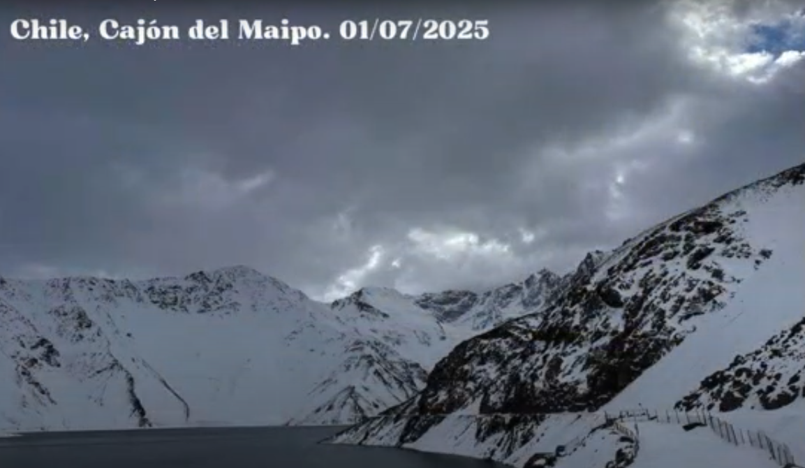 Landscape photo with mountains covered in snow.